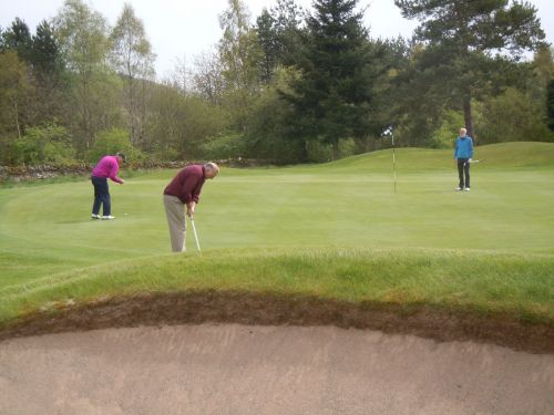 Douglas prepares for another putt